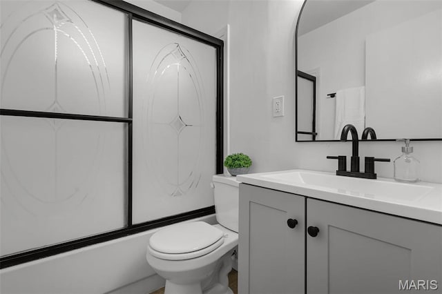 35 Florissant Park Dr, Florissant, MO 63031 - bathroom with toilet, vanity, and enclosed tub / shower combo