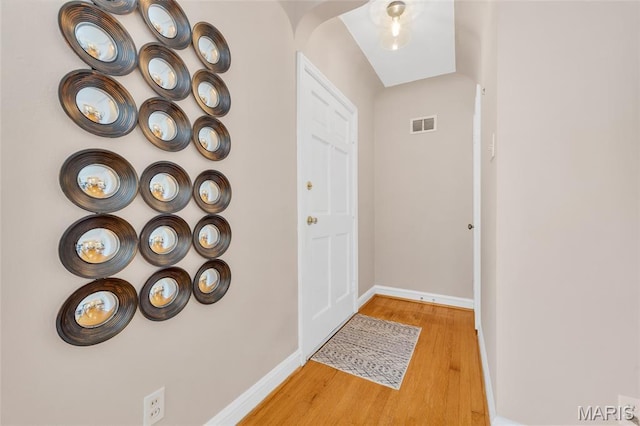 1010 Briarton Dr, Saint Louis, MO 63126 - doorway to outside featuring light wood finished floors and baseboards