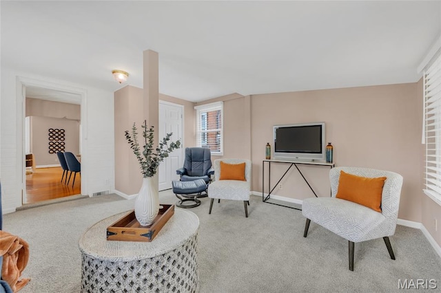 1010 Briarton Dr, Saint Louis, MO 63126 - living area with carpet and baseboards