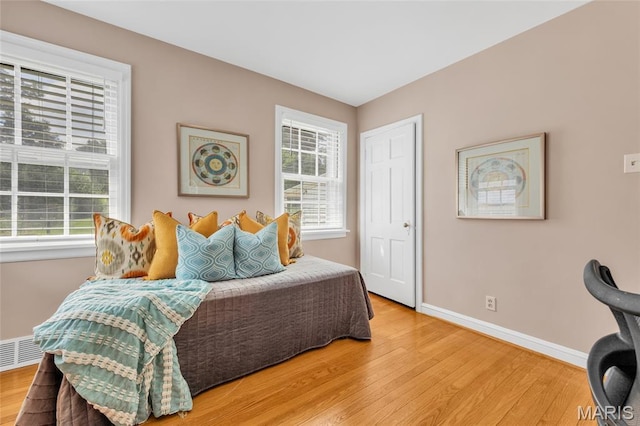 1010 Briarton Dr, Saint Louis, MO 63126 - bedroom featuring wood finished floors and baseboards