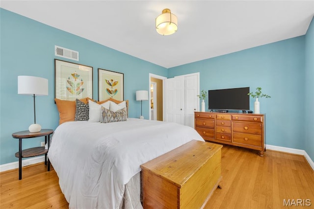 1010 Briarton Dr, Saint Louis, MO 63126 - bedroom with light wood finished floors and a closet