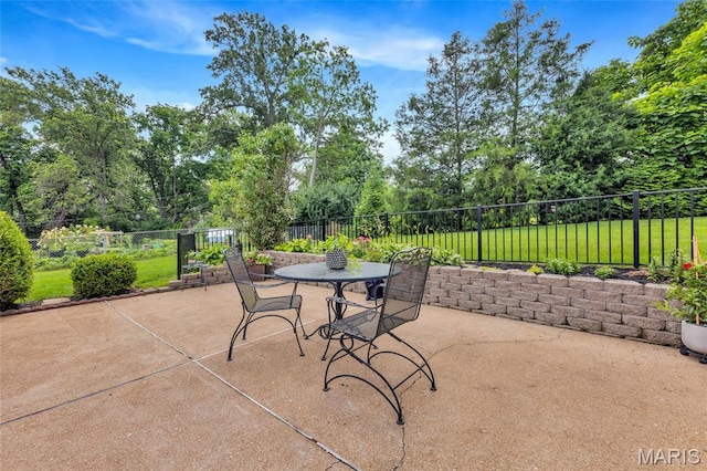 1010 Briarton Dr, Saint Louis, MO 63126 - view of patio with outdoor dining area and view of scattered trees