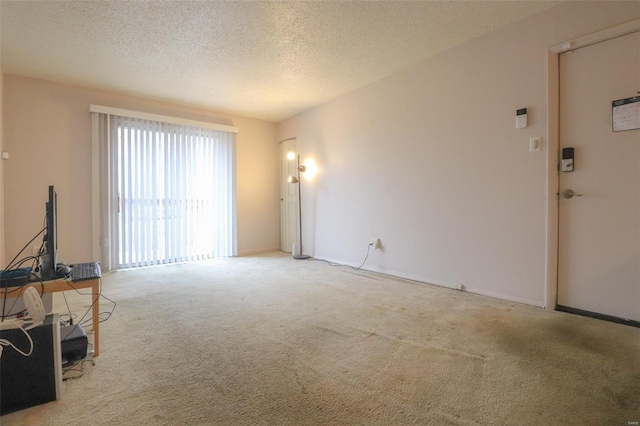 2781 Blackforest Dr Unit C, Saint Louis, MO 63129 - unfurnished room with carpet floors and a textured ceiling