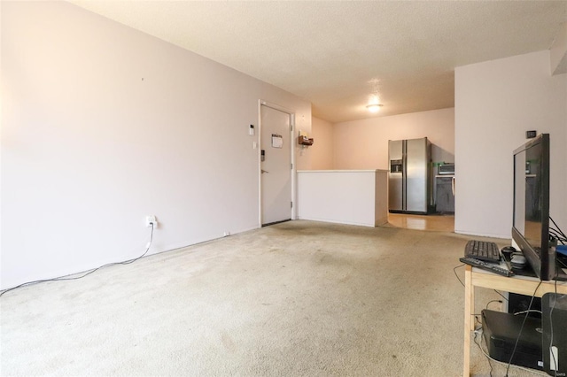 2781 Blackforest Dr Unit C, Saint Louis, MO 63129 - unfurnished living room featuring light colored carpet