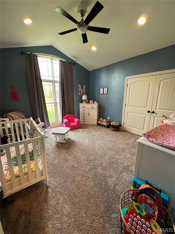 carpeted bedroom with lofted ceiling, recessed lighting, and a ceiling fan