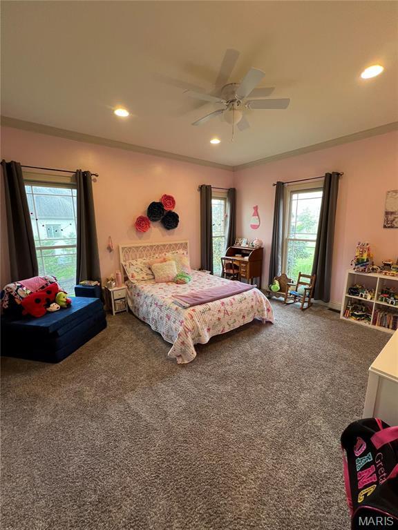 bedroom featuring carpet, a ceiling fan, and recessed lighting