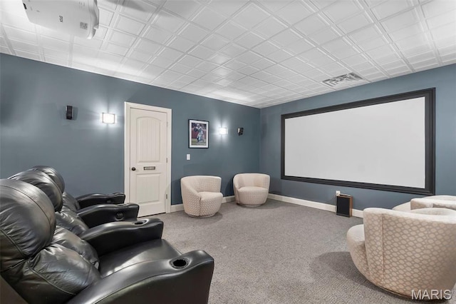cinema with carpet and baseboards