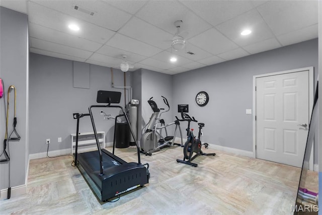workout room with baseboards