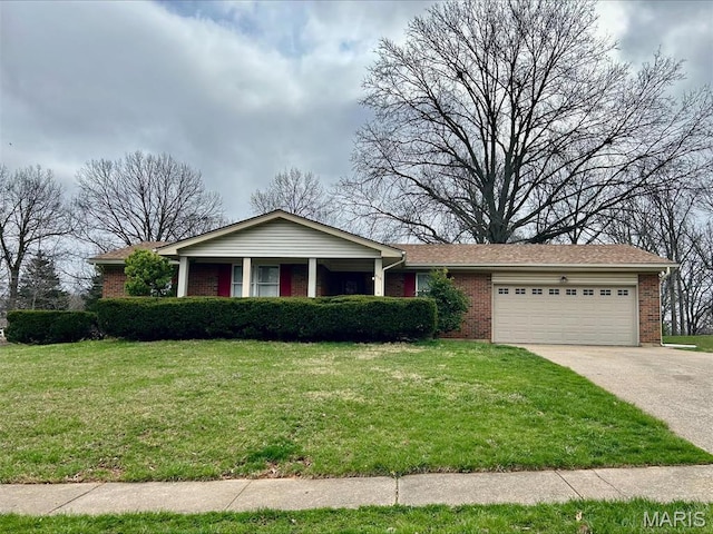 ranch-style home featuring brick siding, a garage, a front lawn, and concrete driveway