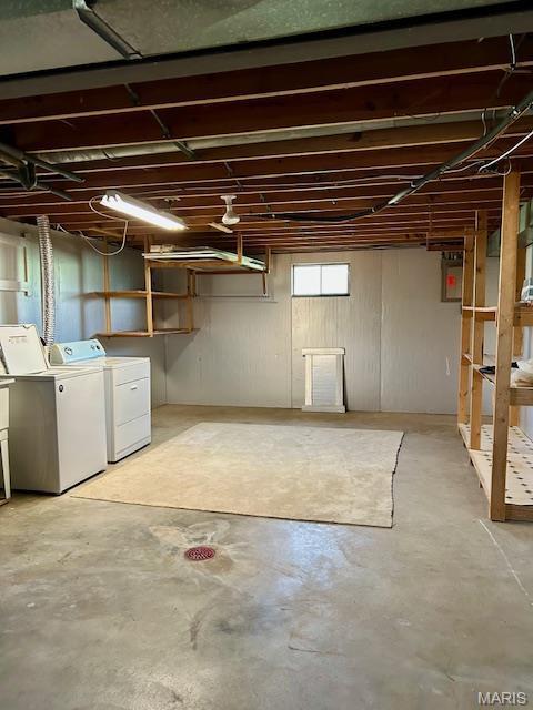 below grade area featuring separate washer and dryer