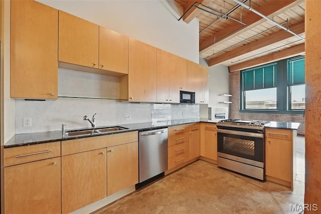 901 Washington Ave Unit 310, Saint Louis, MO 63101 - kitchen featuring stainless steel appliances, a sink, finished concrete floors, dark stone counters, and tasteful backsplash