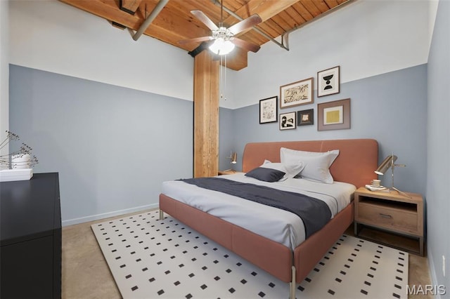 901 Washington Ave Unit 310, Saint Louis, MO 63101 - bedroom featuring wooden ceiling with exposed beams, ceiling fan, and baseboards