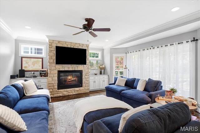 17 Denver Pl, Saint Louis, MO 63119 - living room featuring ornamental molding, a ceiling fan, wood finished floors, a stone fireplace, and recessed lighting