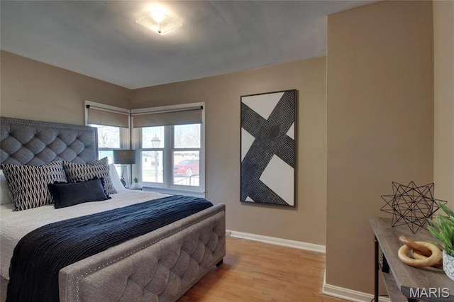 902 E Morgan St, Edina, MO 63537 - bedroom with light wood-type flooring and baseboards