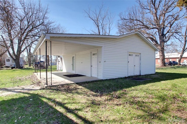 902 E Morgan St, Edina, MO 63537 - view of outdoor structure featuring a carport