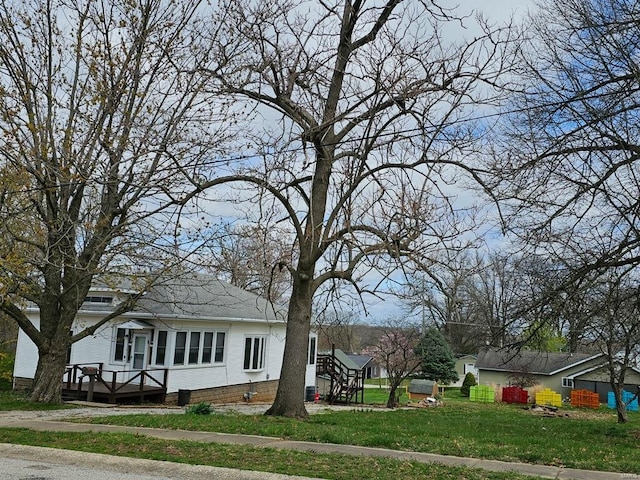 1501 S Main St, Hillsboro, IL 62049 - view of property exterior featuring a lawn and a wooden deck