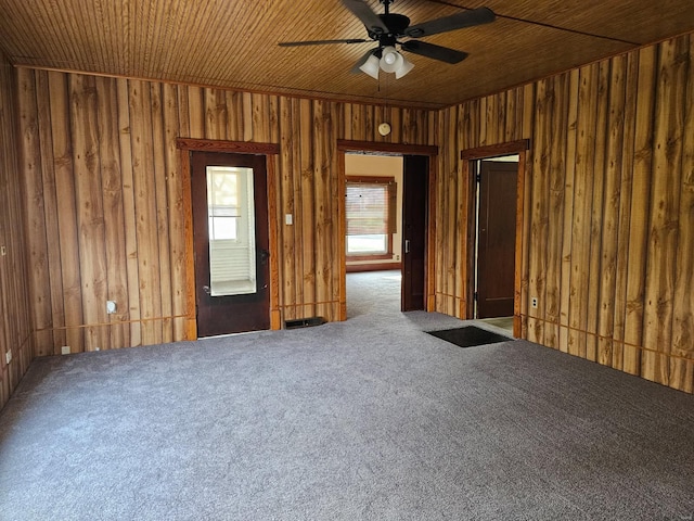 1501 S Main St, Hillsboro, IL 62049 - unfurnished room with a ceiling fan, carpet, and wooden walls