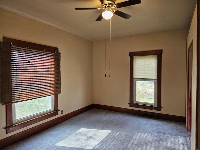 1501 S Main St, Hillsboro, IL 62049 - carpeted spare room with baseboards and ceiling fan