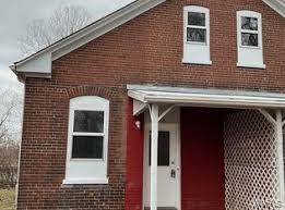 view of front of property featuring brick siding