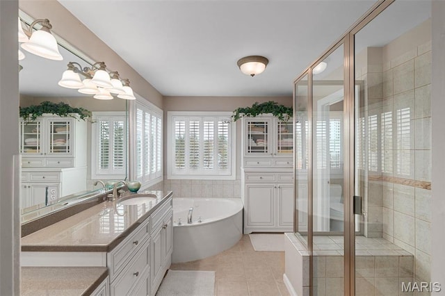 1114 Lockett Rd, Des Peres, MO 63131 - full bath featuring tile patterned flooring, a shower stall, a bath, and vanity