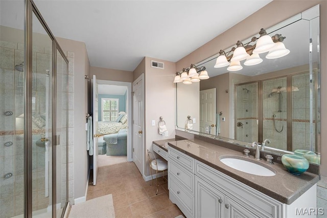 1114 Lockett Rd, Des Peres, MO 63131 - ensuite bathroom with a shower stall, tile patterned flooring, vanity, and baseboards