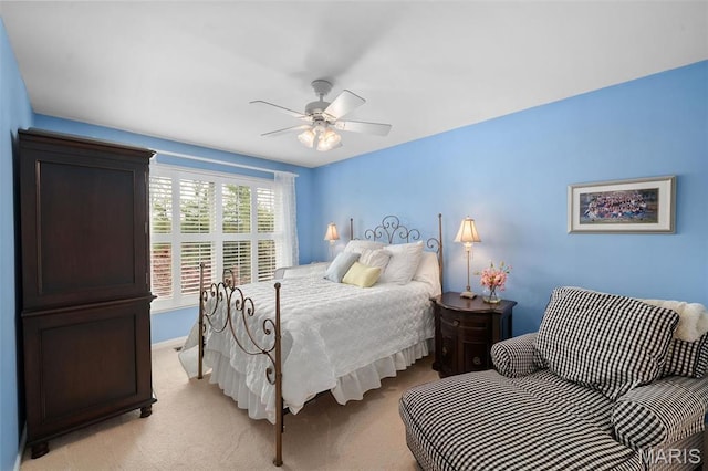 1114 Lockett Rd, Des Peres, MO 63131 - bedroom with light colored carpet, baseboards, and ceiling fan