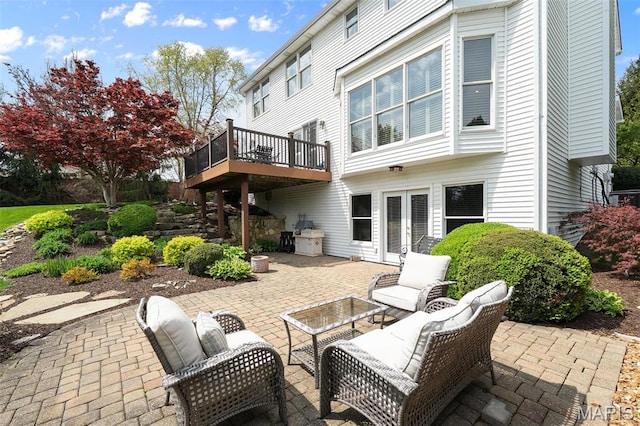 1114 Lockett Rd, Des Peres, MO 63131 - back of property with french doors, a patio area, and a wooden deck