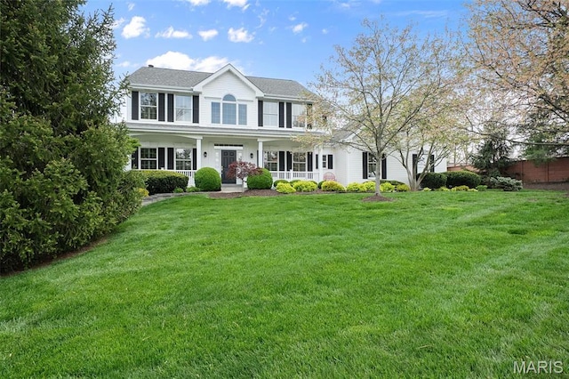 1114 Lockett Rd, Des Peres, MO 63131 - colonial-style house featuring a front lawn and covered porch
