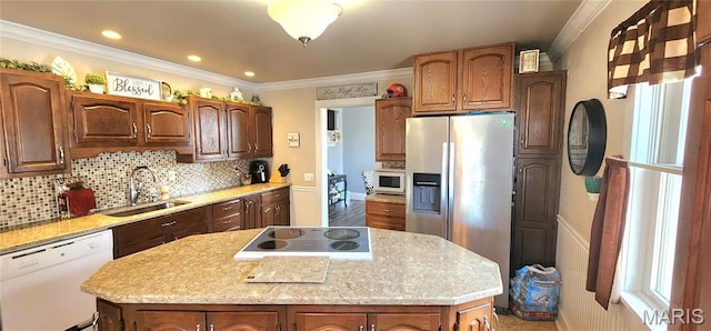 530 W Holmes, Chester, IL 62233 - kitchen featuring white appliances, a sink, light countertops, a kitchen island, and ornamental molding