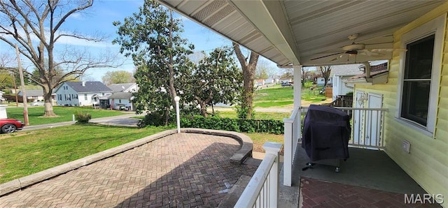 530 W Holmes, Chester, IL 62233 - view of patio / terrace with ceiling fan, a residential view, and area for grilling