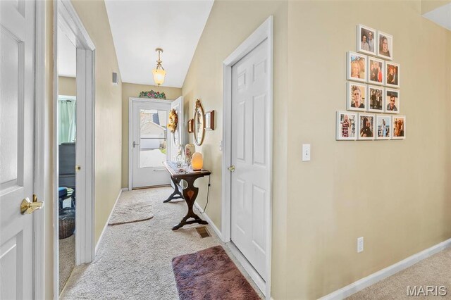 114 Fort Dodge Dr, Wright City, MO 63390 - entryway featuring light carpet and baseboards