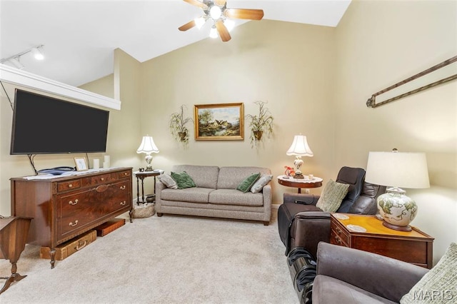 114 Fort Dodge Dr, Wright City, MO 63390 - carpeted living area featuring a ceiling fan, lofted ceiling, and rail lighting