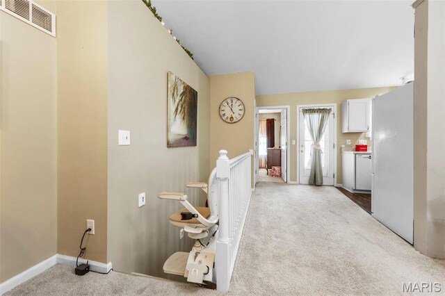 114 Fort Dodge Dr, Wright City, MO 63390 - hallway with carpet floors, an upstairs landing, and baseboards