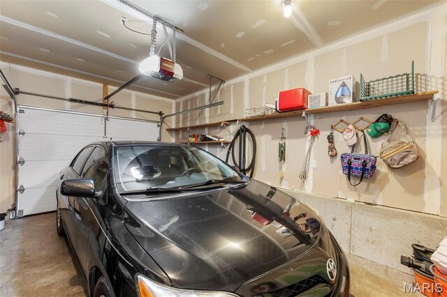 114 Fort Dodge Dr, Wright City, MO 63390 - garage featuring a garage door opener