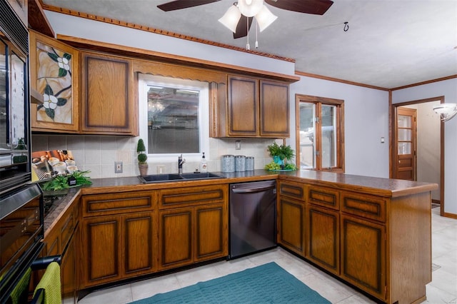 132 S Duncan St, Marine, IL 62061 - kitchen featuring dishwasher, a sink, a peninsula, backsplash, and dark countertops