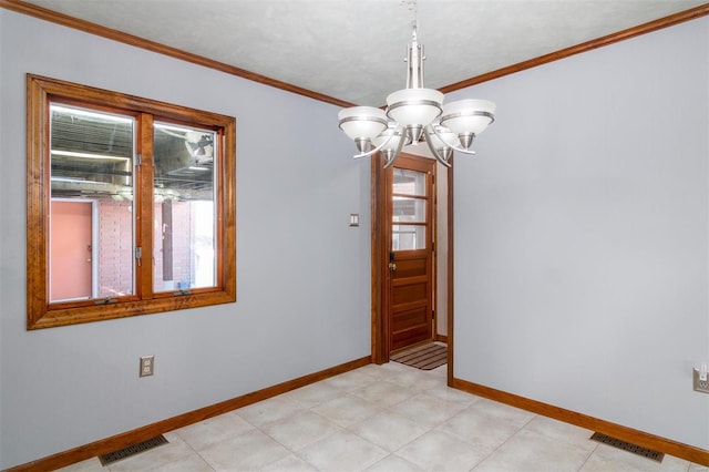132 S Duncan St, Marine, IL 62061 - spare room with ornamental molding, baseboards, and a chandelier