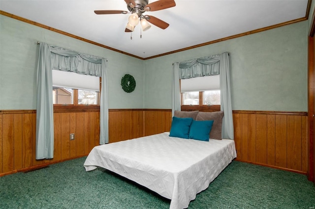 132 S Duncan St, Marine, IL 62061 - bedroom featuring carpet, wainscoting, wooden walls, ornamental molding, and ceiling fan