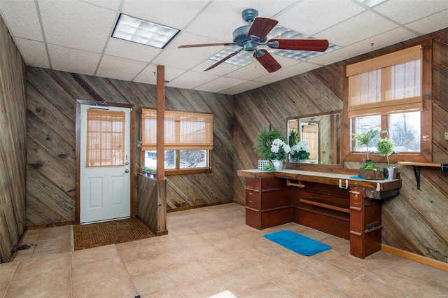 132 S Duncan St, Marine, IL 62061 - entryway featuring wood walls, a drop ceiling, and a ceiling fan