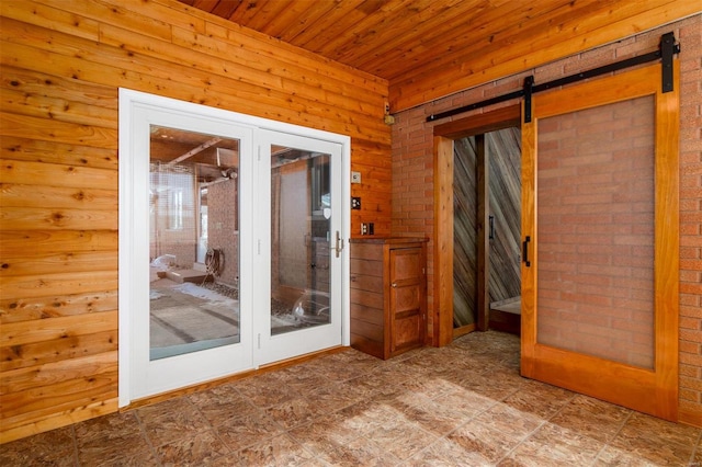 132 S Duncan St, Marine, IL 62061 - empty room featuring wood ceiling, a barn door, and wood walls