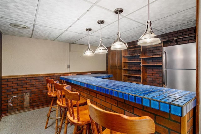132 S Duncan St, Marine, IL 62061 - indoor bar with freestanding refrigerator, pendant lighting, and carpet