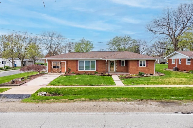 132 S Duncan St, Marine, IL 62061 - ranch-style home featuring a front lawn, brick siding, and driveway