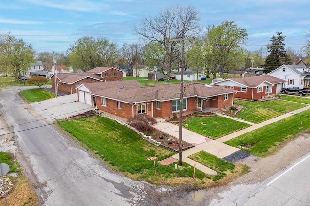 132 S Duncan St, Marine, IL 62061 - view of front of home featuring a residential view, brick siding, driveway, a garage, and a front yard