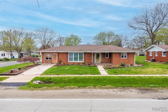 132 S Duncan St, Marine, IL 62061 - ranch-style house with a front lawn, brick siding, and concrete driveway