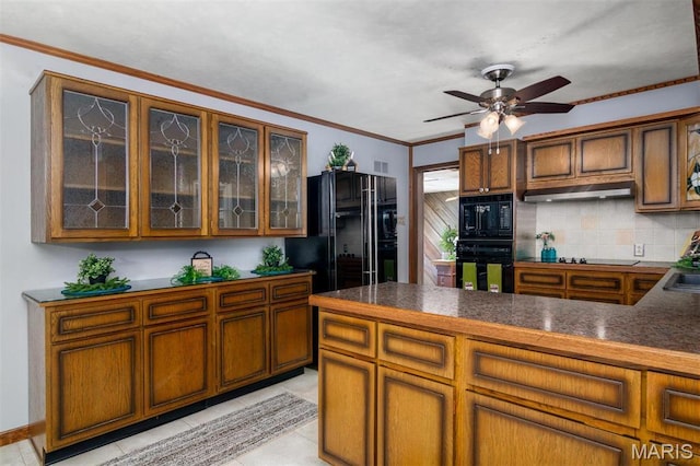 132 S Duncan St, Marine, IL 62061 - kitchen with black appliances, under cabinet range hood, decorative backsplash, brown cabinetry, and ornamental molding