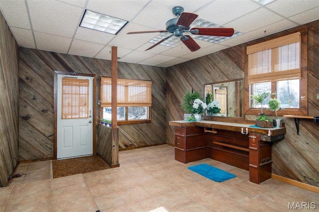 132 S Duncan St, Marine, IL 62061 - foyer entrance featuring wood walls, a paneled ceiling, and ceiling fan