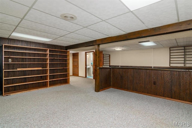 132 S Duncan St, Marine, IL 62061 - finished below grade area with a paneled ceiling, carpet, wood walls, and wainscoting