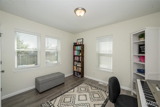 409 Jett Ave, Saint Louis, MO 63125 - office featuring dark wood-style floors and baseboards