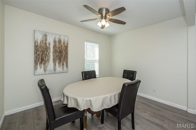 409 Jett Ave, Saint Louis, MO 63125 - dining space with dark wood finished floors, baseboards, and ceiling fan