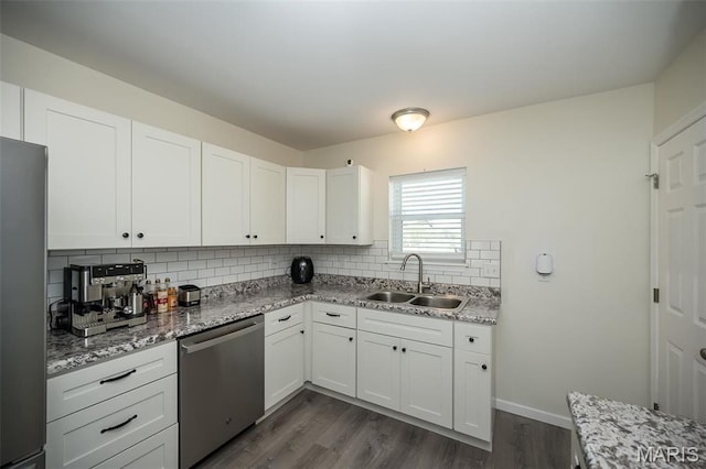 409 Jett Ave, Saint Louis, MO 63125 - kitchen featuring dishwasher, a sink, freestanding refrigerator, decorative backsplash, and dark wood-style floors