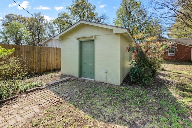 605 W Washington St, Kennett, MO 63857 - view of shed featuring fence